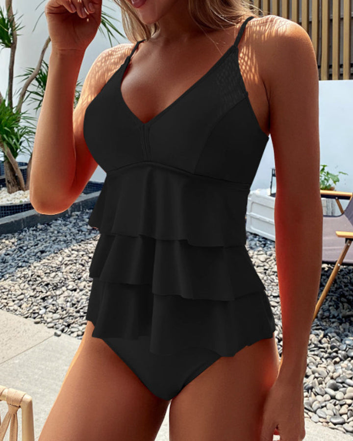Remedios | Traje de baño liso con volantes elegantes